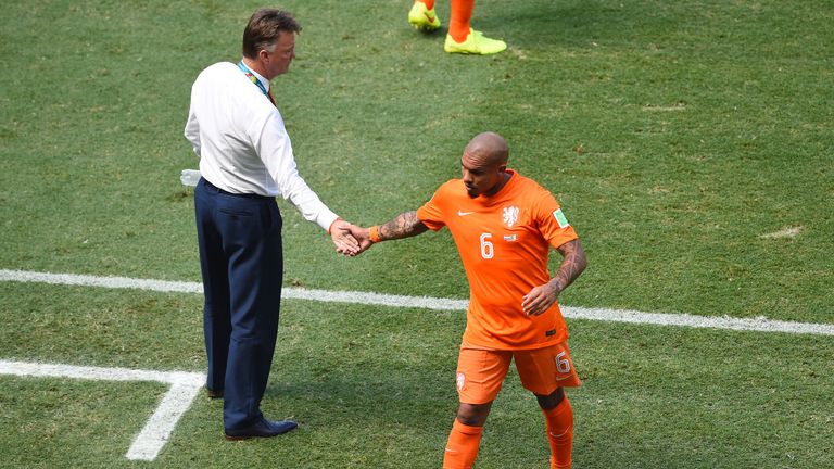FORTALEZA, BRAZIL - JUNE 29: Nigel de Jong of the Netherlands shakes hands with head coach Louis van Gaal as he exits the World Cup clash v Mexico