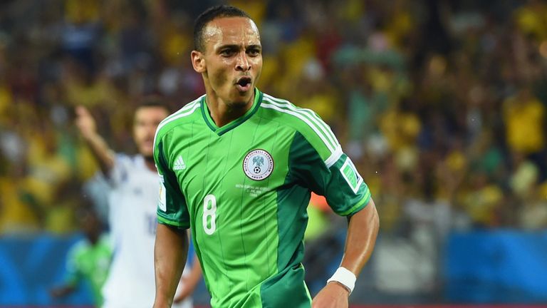 CUIABA, BRAZIL - JUNE 21:  Peter Odemwingie of Nigeria (L) celebrates scoring his team's first goal during the 2014 FIFA World Cup Group F match between Ni