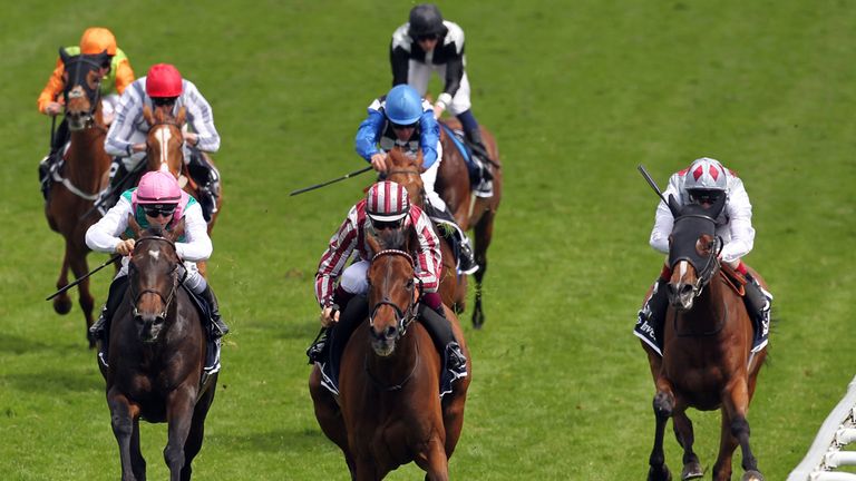 Cirrus Des Aigles ridden by Christophe Soumillon on their way to victory in the Investec Coronation Cup at Epsom Downs Racecourse