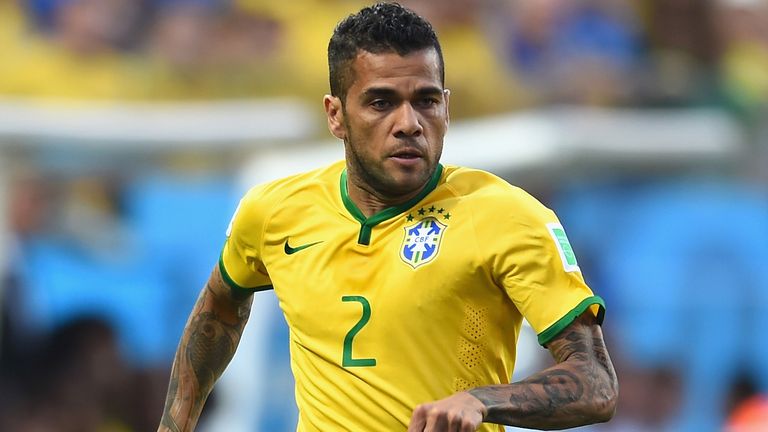 Dani Alves of Brazil in action during the 2014 FIFA World Cup Brazil Group A match between Brazil and Croatia at Arena de Sao Paulo