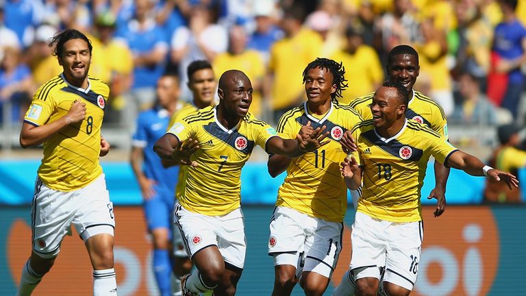 BELO HORIZONTE, BRAZIL - JUNE 14:  Pablo Armero of Colombia (C) celebrates with teammates after scoring his teams first goal during the 2014 FIFA World Cup