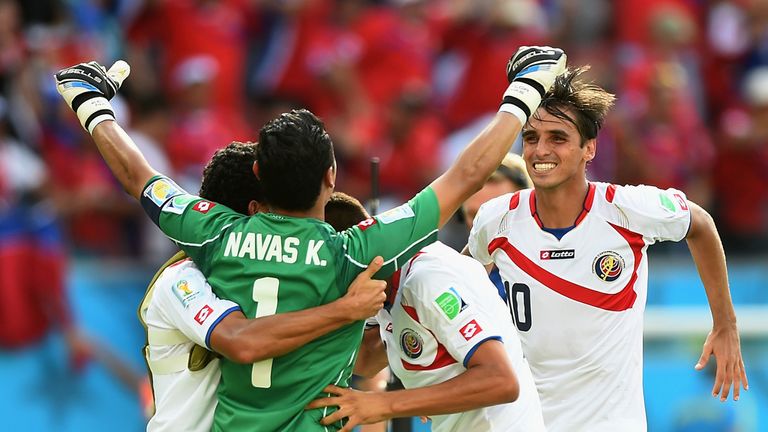 RECIFE, BRAZIL - JUNE 20:  Keylor Navas and Bryan Ruiz of Costa Rica celebrate victory with their teammates after a 1-0 victory over Italy in the 2014 FIFA