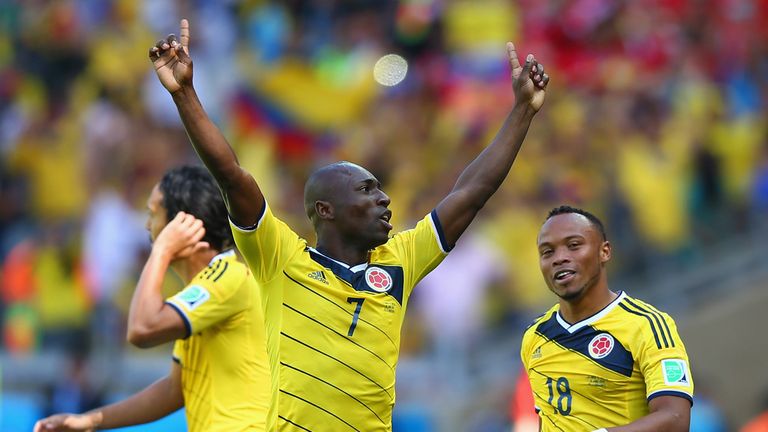 BELO HORIZONTE, BRAZIL - JUNE 14:  Pablo Armero of Colombia celebrates with his team-mates after scoring the first goal during the 2014 FIFA World Cup Braz