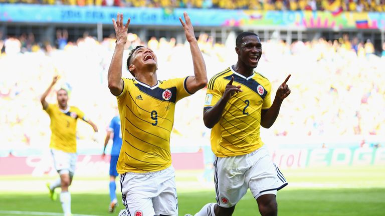 BELO HORIZONTE, BRAZIL - JUNE 14:  Teofilo Gutierrez of Colombia (L) celebrates scoring his teams second goal with Cristian Zapata during the 2014 FIFA Wor