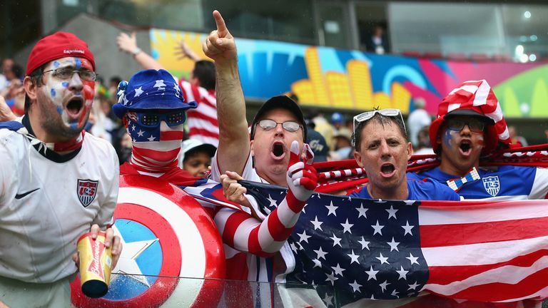 RECIFE, BRAZIL - JUNE 26:  United States fans cheer in the rain prior to the 2014 FIFA World Cup Brazil group G match between the United States and Germany