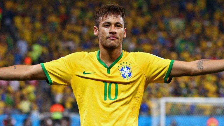 Neymar of Brazil celebrates after scoring his second goal on a penalty kick in the second half during the 2014 FIFA World Cup