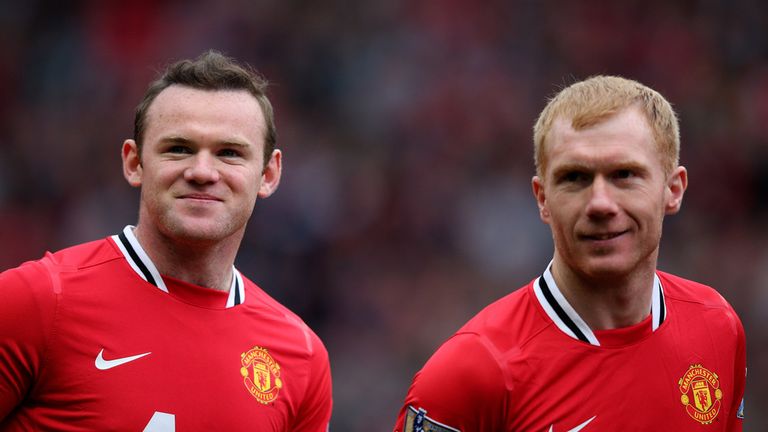 MANCHESTER, ENGLAND - APRIL 15:  Wayne Rooney  and Paul Scholes (R) of Manchester United look on prior to the Barclays Premier League match between Manches