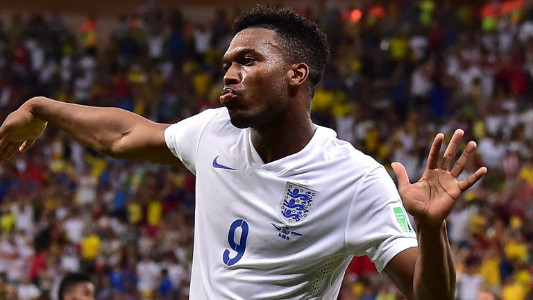 England's forward Daniel Sturridge celebrates after scoring a goal during a Group D football match between England and Italy at the Amazonia Arena 