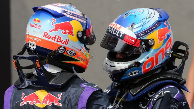 Daniel Ricciardo is congratulated by Sebastian Vettel