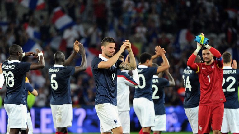 France celebrate their 8-0 victory over Jamaica