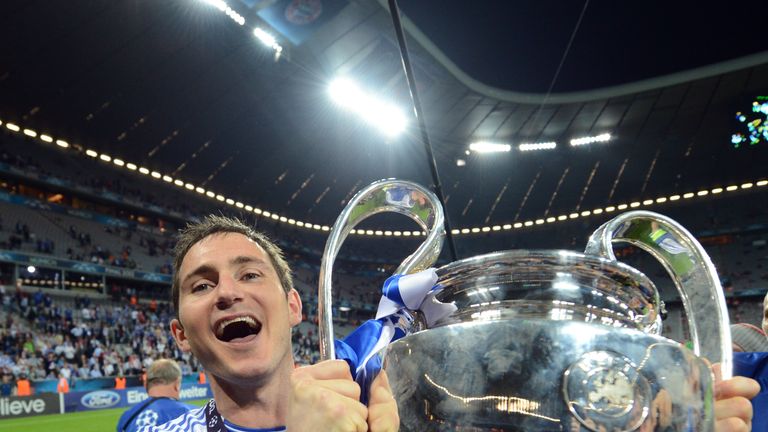 Frank Lampard holds the Champions League trophy after Chelsea's penalty win over Bayern Munich