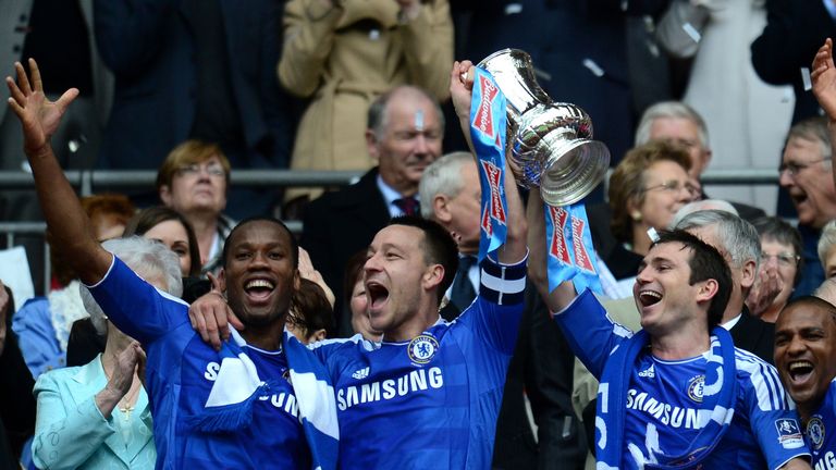 Frank Lampard lifts the 2012 FA Cup alongside John Terry and Didier Drogba