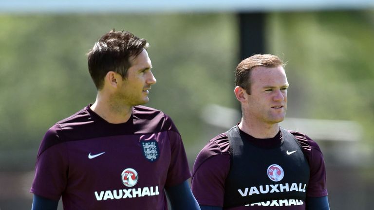 England midfielder Frank Lampard and forward Wayne Rooney arrive for a training session at Barry University in Miami Shores, Florida on June 6, 2014