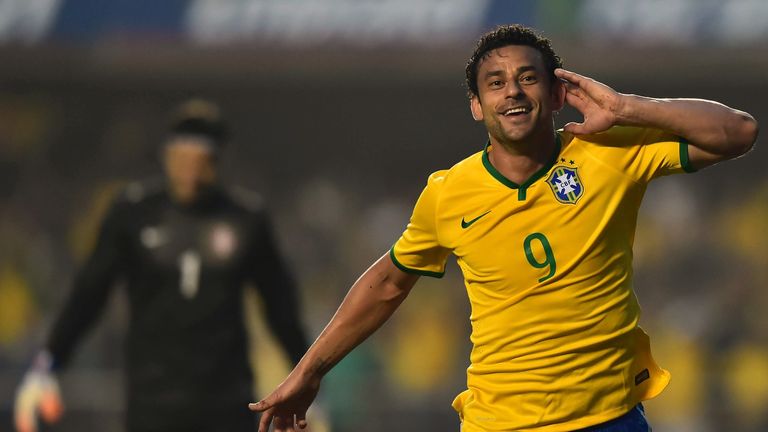 Brazil's Fred celebrates after scoring against Serbia during a friendly