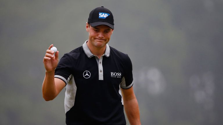 Martin Kaymer of Germany waves after putting on the tenth green during the second round of the 114th U.S. Open at Pinehurst