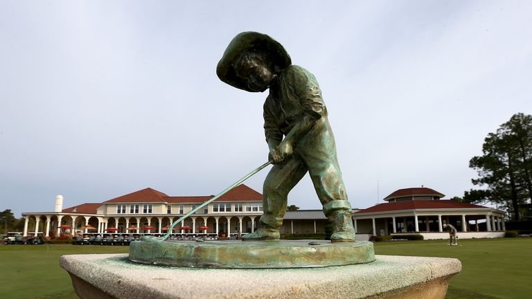 A statue of Putter Boy outside the clubhouse