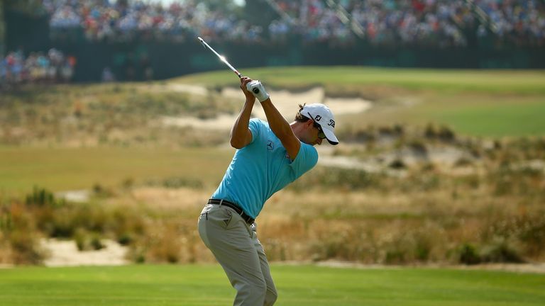 Adam Scott of Australia hits his tee shot on the 13th hole during the first round of the 114th U.S. Open at Pinehurst