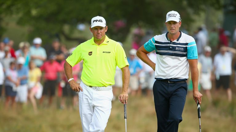 Lee Westwood of England and Henrik Stenson of Sweden wait on a green during the first round of the 114th U.S. Open at Pinehurst