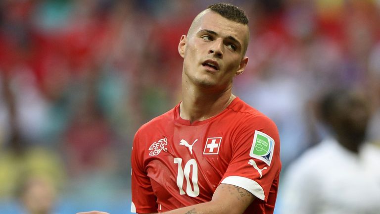 Switzerland's midfielder Granit Xhaka reacts during a Group E football match between Switzerland and France at the Fonte Nova Arena 