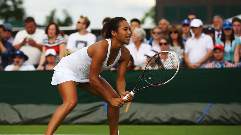 Heather Watson of Great Britain in doubles action at Wimbledon 2014