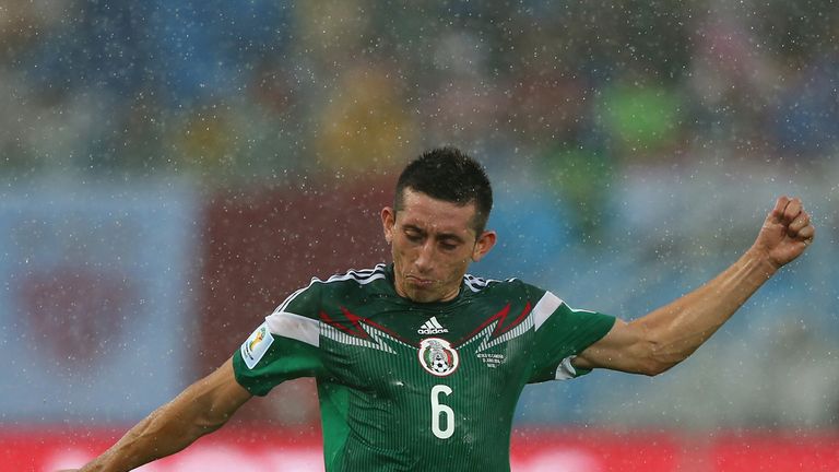 Hector Herrera of Mexico controls the ball during the 2014 FIFA World Cup Brazil Group A match between Mexico and Cameroon