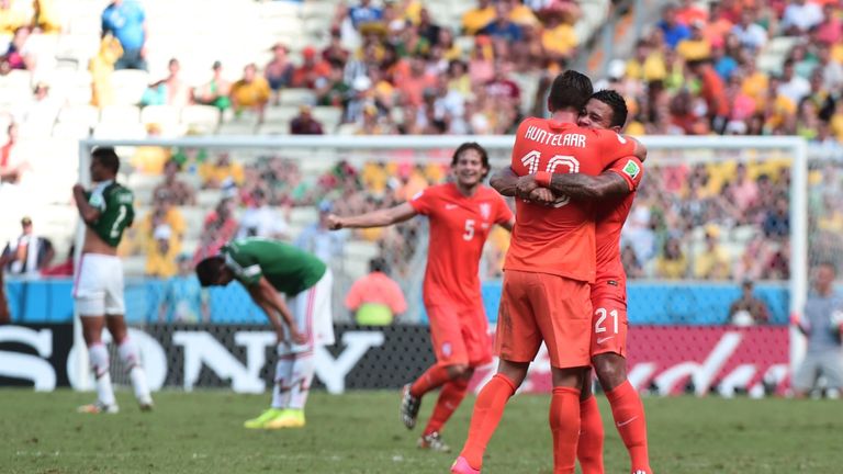 Holland celebrate their victory over Mexico in the World Cup round of 16 clash in Fortaleza