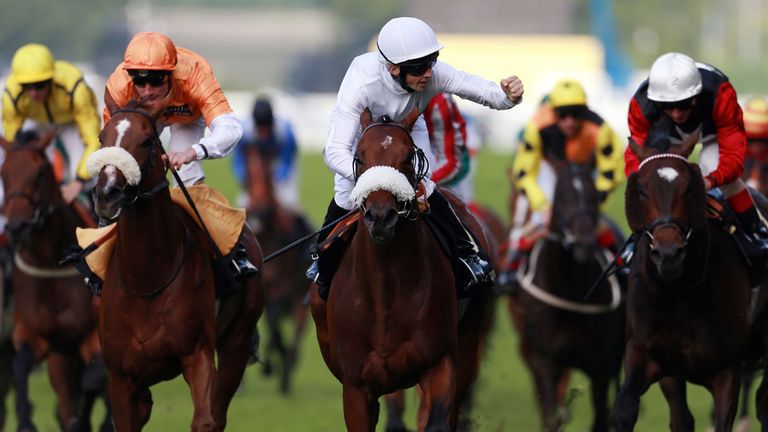 David Probert celebrates as Born In Bombay wins the Britannia