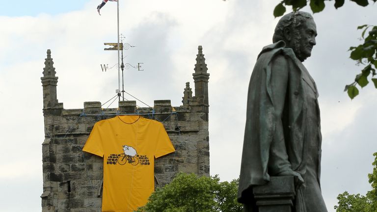 ILKLEY, UNITED KINGDOM - JUNE 24: A church is adorned with a giant yellow jersey in Ilkley Yorkshire prepares to host the Tour de France Grand Depart, on J