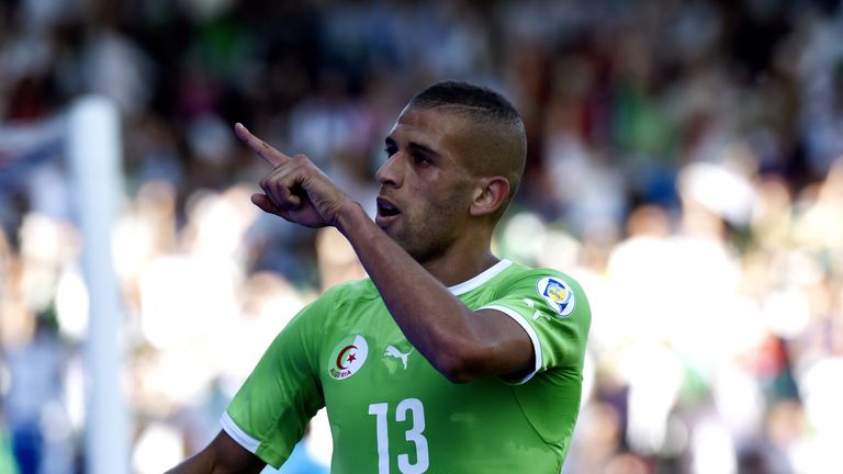 Algeria forward Islam Slimani celebrates after scoring against Armenia