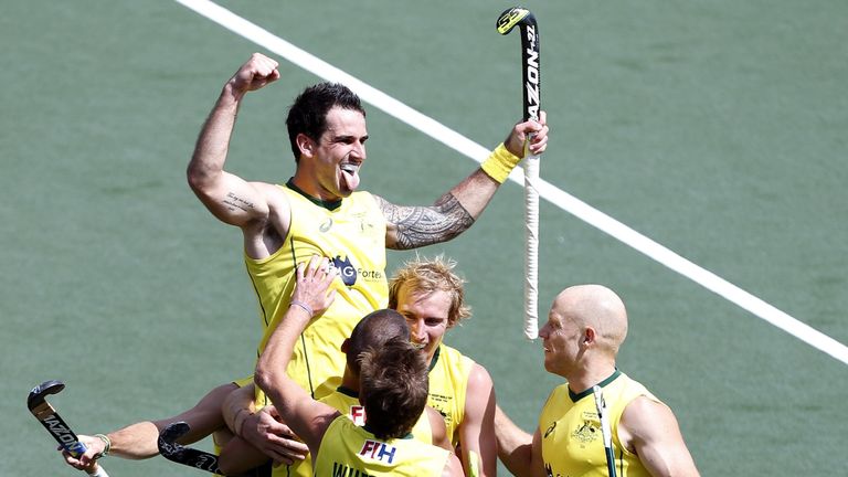 Kieran Govers (top) celebrates after putting Australia 2-1 ahead