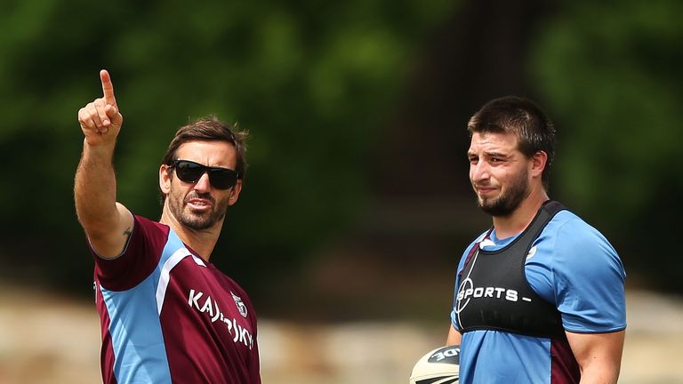 Sea Eagles assistant coach Andrew Johns speaks with Liam Foran during a Manly Sea Eagles NRL pre-season training session 