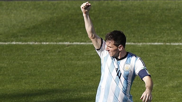 Argentina's forward and captain Lionel Messi celebrates scoring during the Group F football match between Argentina and Iran at the Mineirao Stadium