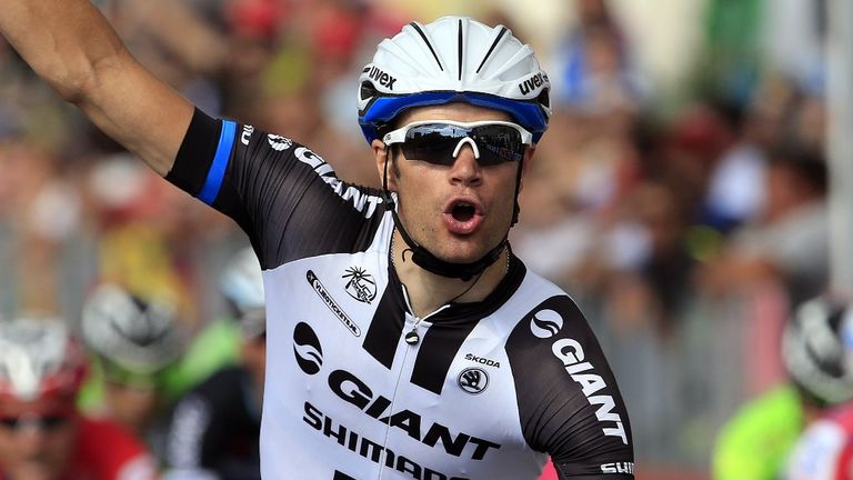 Slovenia's Luka Mezgec rreacts  as he crosses the finish line to win the 21st stage of the 97th Giro d'Italia 172km from Gemona to Trieste