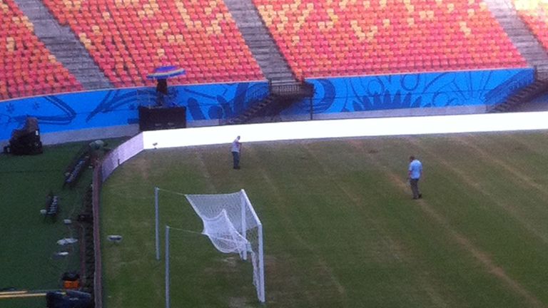 Picture taken from a smartphone from the Press tribune of Manaus stadium on June 10 2014 showing the pitch of the Amazonia Arena at the World Cup