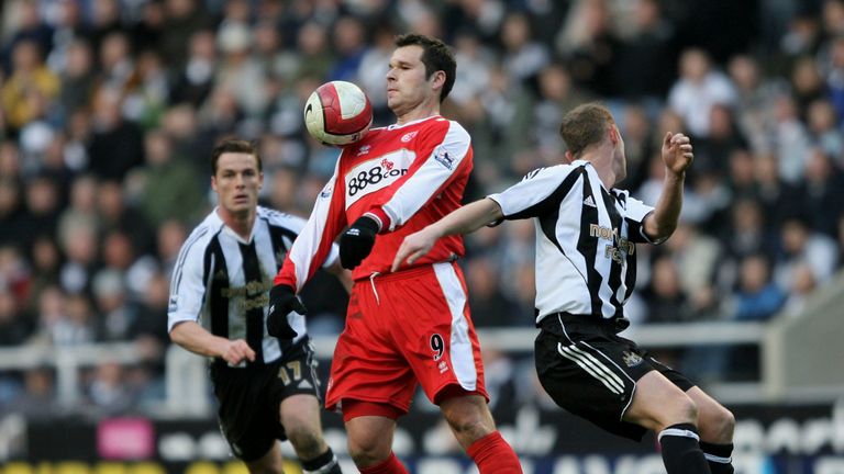 NEWCASTLE, ENGLAND - MARCH 3: Mark Viduka  of Middlesbrough in action with Nicky Butt of Newcastle United during the Barclays Premiership match between  Ne