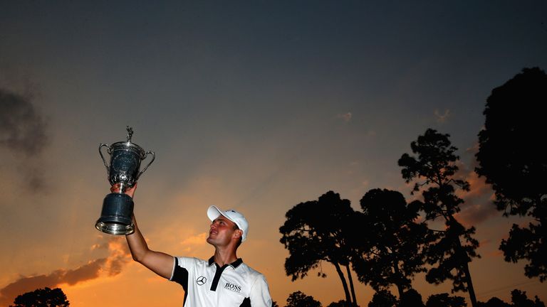PINEHURST, NC - JUNE 15:  Martin Kaymer of Germany celebrates with the trophy after his eight-stroke victory during the final round of the 114th U.S. Open 