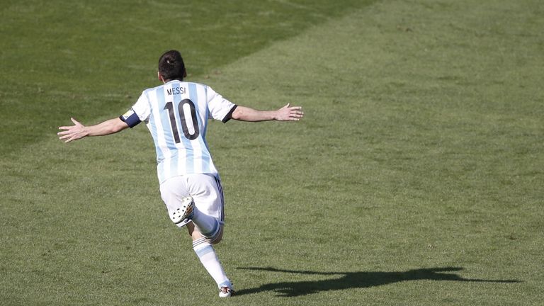 Argentina's forward and captain Lionel celebrates scoring during the Group F football match between Argentina and Iran at the Mineirao Stadium