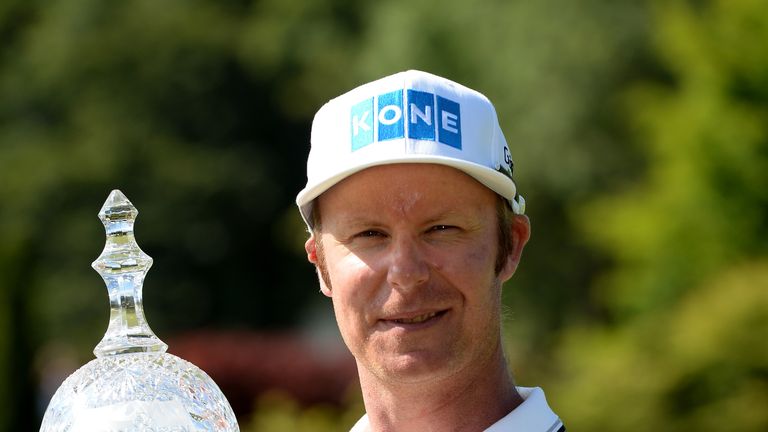 Mikko Ilonen celebrates with the winners trophy after the final round of the Irish Open at the Fota Island Resort
