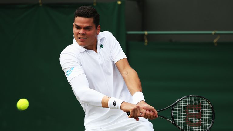 Milos Raonic in action during his Gentlemen's Singles second round match at Wimbledon
