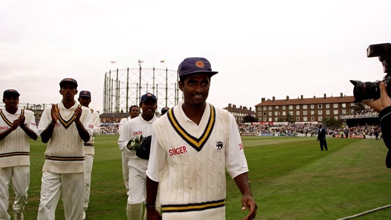 31 Aug 1998:  Muttiah Muralitharan leads Sri Lanka off at the Oval during the Test against England.