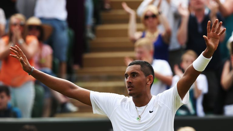 Nick Kyrgios celebrates after coming from two sets down to upset 13th seed Richard Gasquet 
