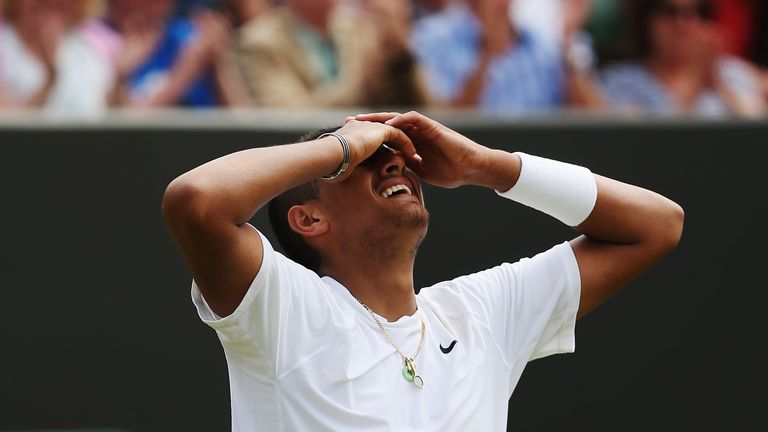 Nick Kyrgios elebrates after winning his Gentlemen's Singles second round match at Wimbledon