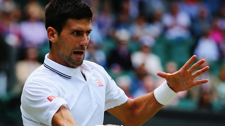 LONDON, ENGLAND - JUNE 27:  Novak Djokovic of Serbia plays a forehand return during his Gentlemen's Singles third round match against Gilles Simon of Franc