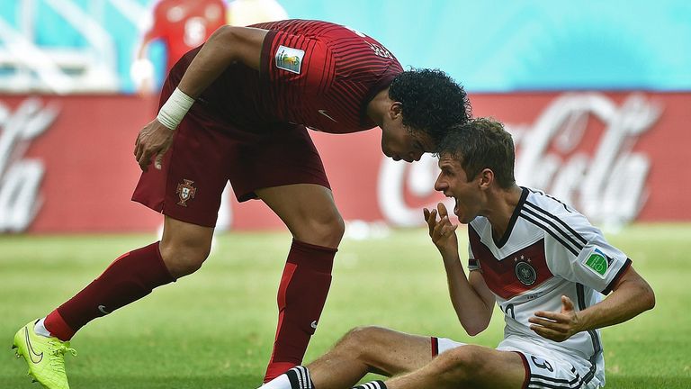 Portugal's defender Pepe (R) fouls Germany's forward Thomas Mueller before being sent off during the Group G football match between Germany and Portugal 