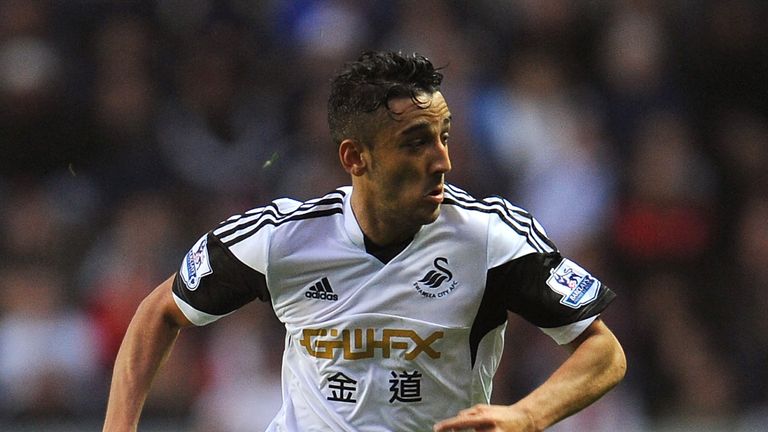  Neil Taylor of Swansea City in action.