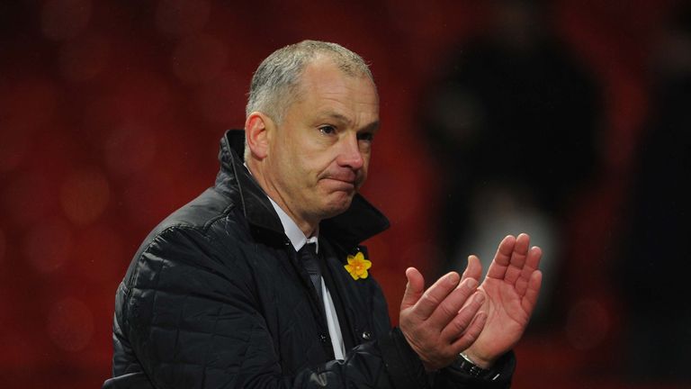 MANCHESTER, ENGLAND - MARCH 16:  Reading Caretaker Manager Eamonn Dolan applauds the fans at the end of the Barclays Premier League match between Mancheste