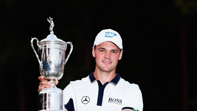 PINEHURST, NC - JUNE 15:  Martin Kaymer of Germany celebrates with the trophy after his eight-stroke victory during the final round of the 114th U.S. Open 