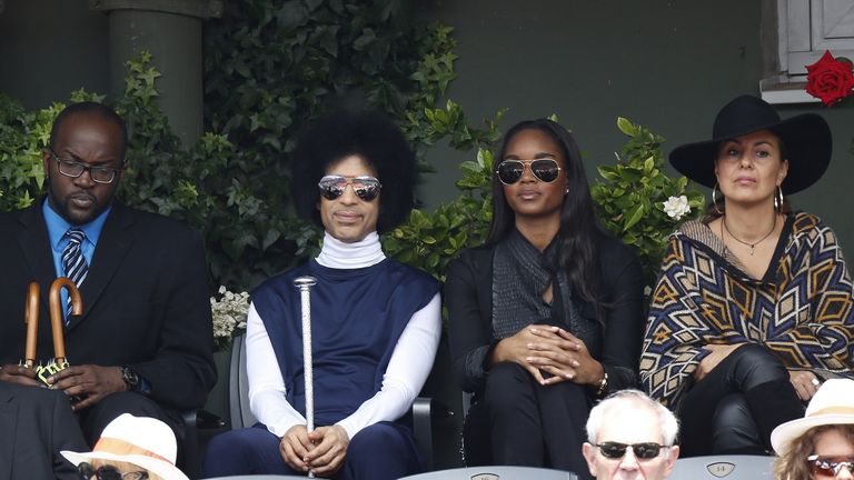US singer Prince attends the French tennis Open round of sixteen match between Spain's Rafael Nadal and Serbia's Dusan Lajovic at the Roland Garros stadium