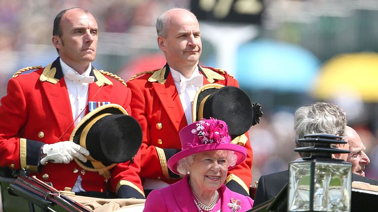 The Queen arrives and the gamble on a yellow hat is sunk 