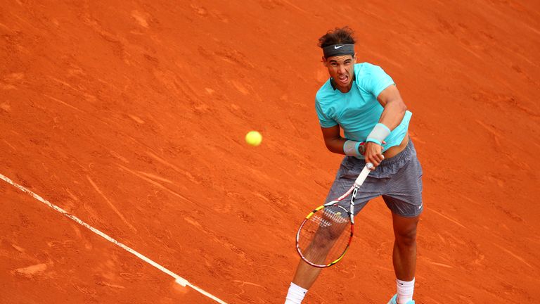 Defending champion Rafael Nadal beat Dusan Lajovic 6-1 6-2 6-1 on day nine of the French Open to progress easily into the quarter-finals